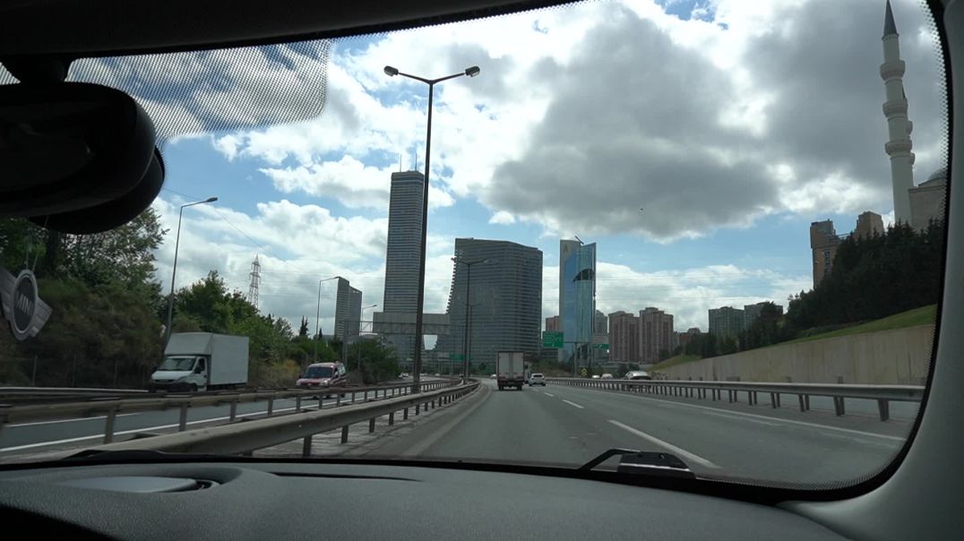 Stock Video of Driving Through City Skyline